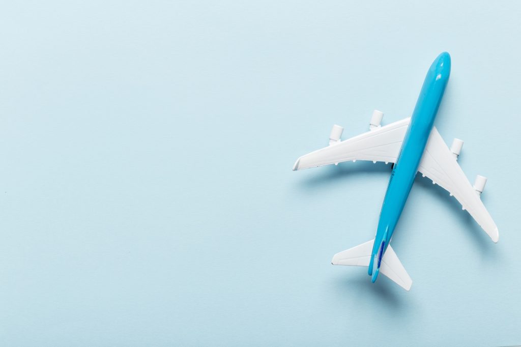 Miniature airplane travel theme